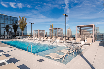 Resort style outdoor pool at 903 peachtree apartments in atlanta, ga 30309
